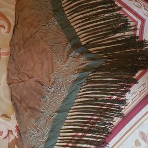 Fringed scarf/shawl.